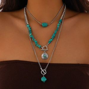 Boho halsband med western-berlocker Silver och turkos