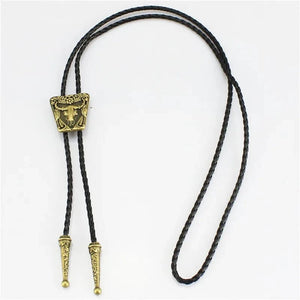 Bolo tie med oxskalle i metall och läderband