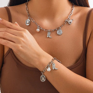 Chunky guldhalsband och armband med western-berlocker Silver