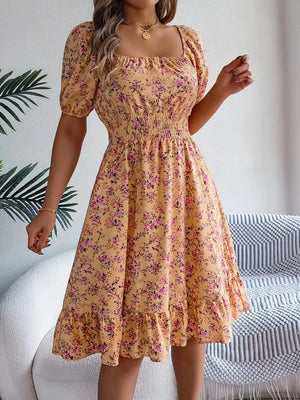 Blommig off-shoulder midiklänning