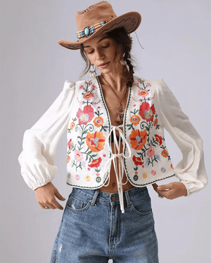 Broderad blus med blommor