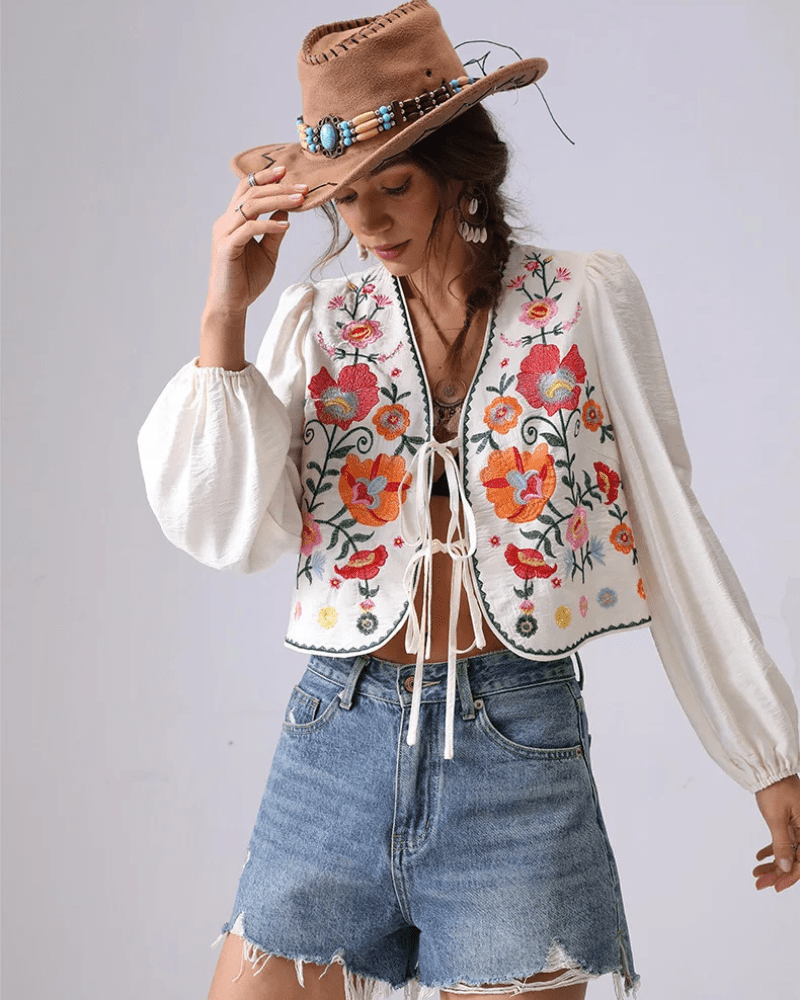 Broderad blus med blommor