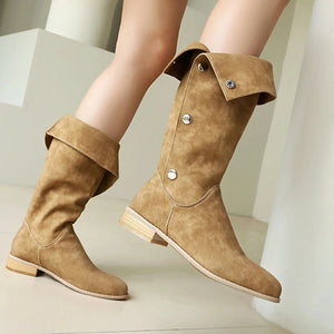 Cowboyboots i mockalook med knappar och bred skaftöppning