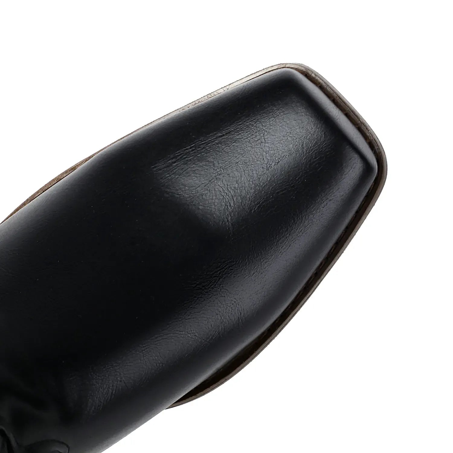 Cowboyboots med elegant broderi och glansig yta