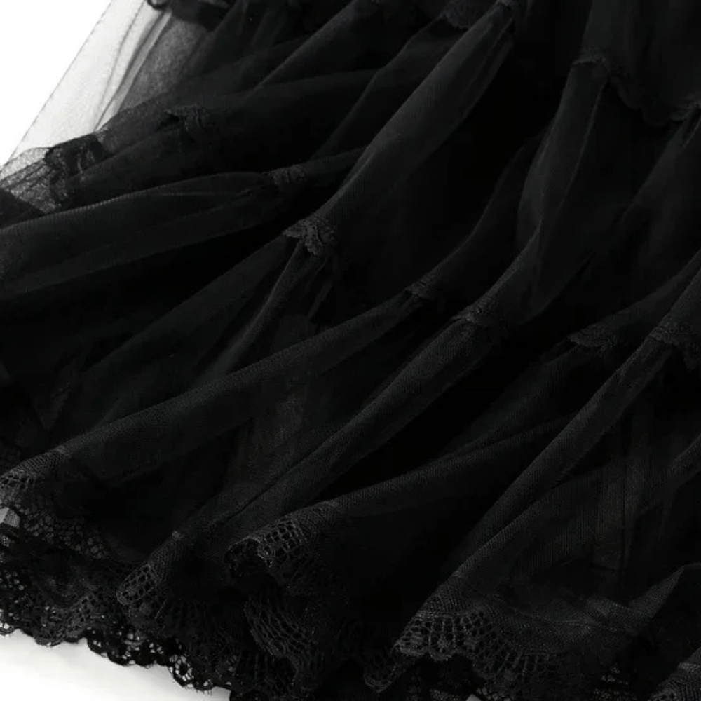 Lång A-linje tyllkjol med plisserade volanger