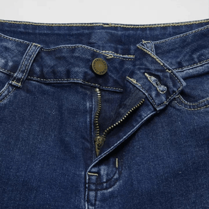 Mörkblå bootcut jeans med broderat hjärta och hästmotiv
