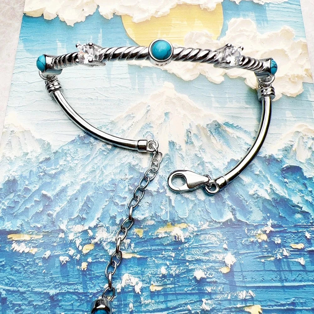 Stelt Silverarmband med Vriden Design och Turkosa Stenar Silver med turkos