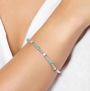 Stelt Silverarmband med Vriden Design och Turkosa Stenar Silver med turkos