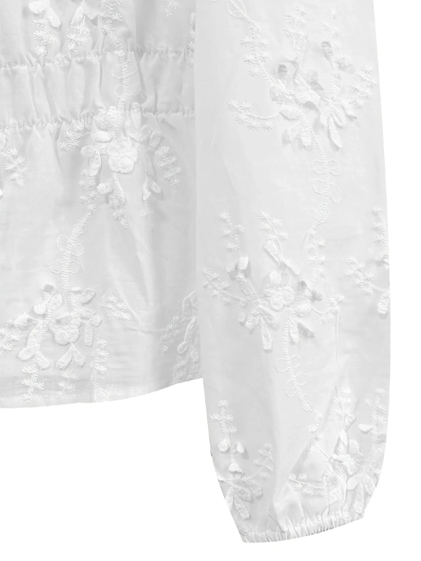 Vit broderad blus i broderie anglaise med ballongärm